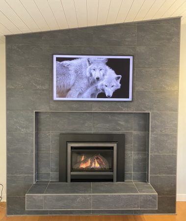 Grey Tile Fireplace with Inset Hearth and Cantilever Bench